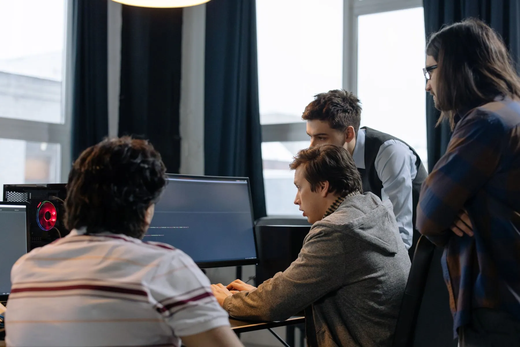 Developers working at their monitors